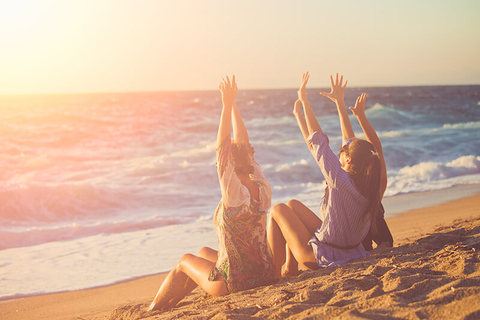 women on the beach // Photo by Astarot/iStock/Getty Images Plus/Getty Images three women on the beach