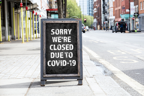 Sorry we're CLOSED due to COVID-19. Foldable advertising poster on the street Sorry we're CLOSED due to COVID-19. Foldable advertising poster on the street