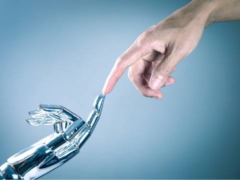 Robotic Process Automation robot finger meets human finger
