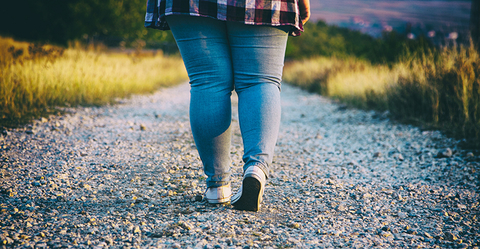 Obese Woman Walking Outdoors