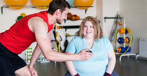Trainer with client who is obese