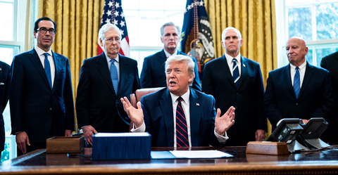 President Trump signing the CARES Act