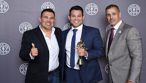 Gold's Gym award recipients Esteban Garcia and Eliud Garcia with Craig Sherwood