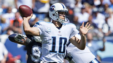Tennessee Titans quarterback Jake Locker opened the Locker Room fitness center with Tampa Bay Buccaneers punter Michael Koenen in Ferndale WA Photo by Wesley HittGetty Images