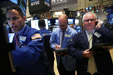 Traders work on the floor of the New York Stock Exchange NYSE on August 24 2015 in New York City As the global economy continues to react from events in China markets dropped significantly around the world on Monday Photo by Spencer PlattGetty Images