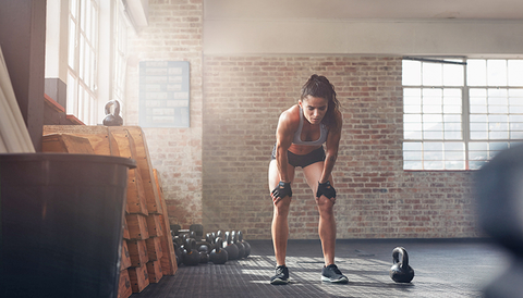 A woman resting after a workout