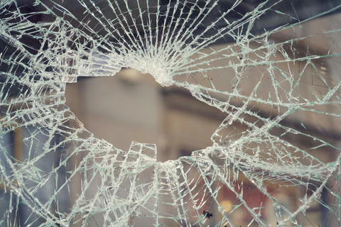 Broken security glass window Hole in broken window