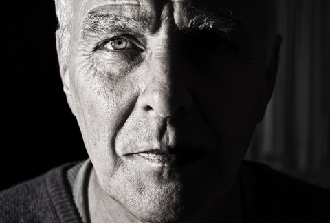 Old man black white Black and white photo of old man half of face in shadow