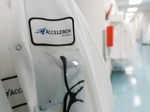 Acceleron Acceleron badge on lab coat