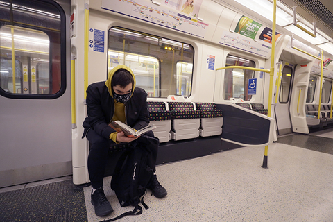 A man wearing a mask on the London Underground due to coronavirus A man wearing a mask on the London Underground due to coronavirus