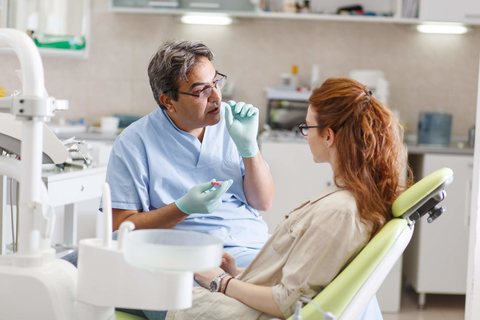Dentist and patient Dentist and patient