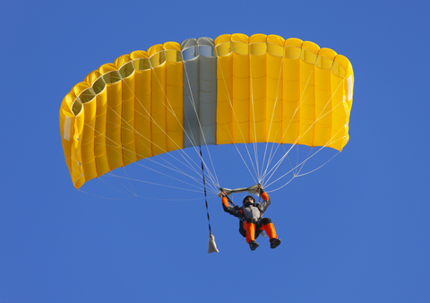 Parachute on a clear blue sky Parachute