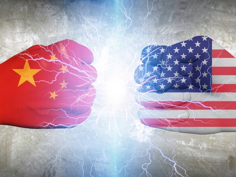 Chinese and US fists meet image represents actual trade war