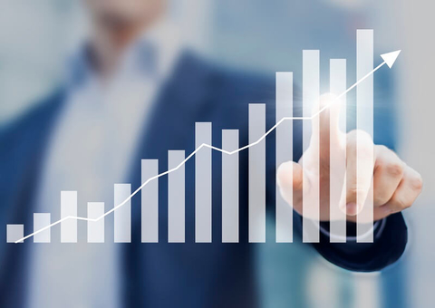 Finance concept abstract generic Money Cash Revenue Profits Business (Getty/NicoElNino) A bar chart showing positive business growth
