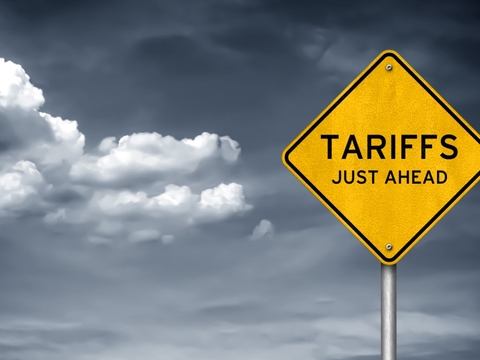 Road sign "tariffs just ahead" trade protectionism