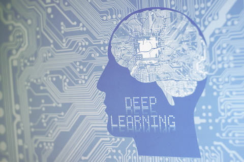 Human head (profile) with a circuit brain board inside and Deep Learning logo. Deep learning concept with circuit brain board.