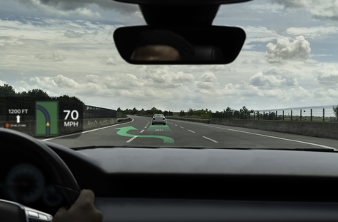 Heads-up display car Heads-up display car on road with arrow superimposed on highway