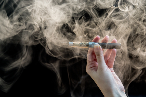 Electronic cigarette woman vaping Electronic cigarette woman vaping