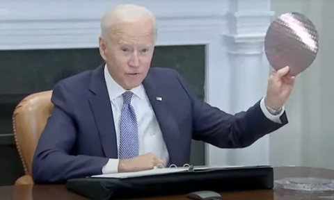 biden holding wafer biden holding wafer