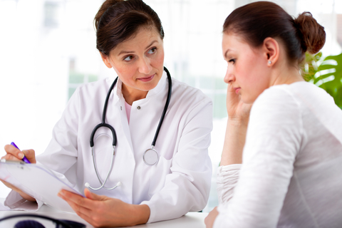 Unhappy female patient (CREDIT: Getty/AlexRaths) Unhappy female patient and doctor
