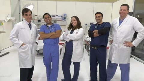 Doctors posing for the camera