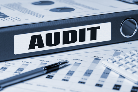 Audit (Credit: Getty/cacaroot) Audit with magnifying glass