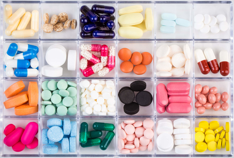 Pills in pill container Pills in pill container