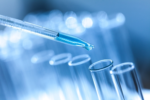 Lab materials Blue-hued test tubes and dropper