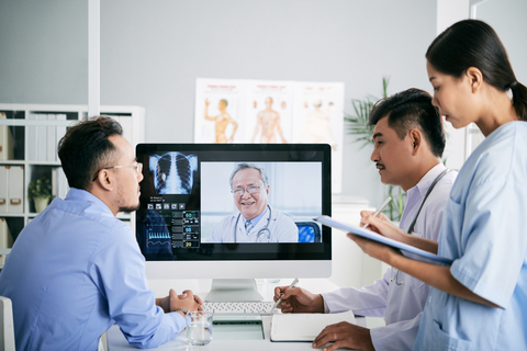 Telemedicine Doctors look at scan
