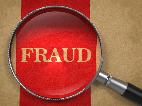 Fraud Concept magnifying glass CREDIT: Getty/Tashatuvango A magnifying glass over the word "fraud"