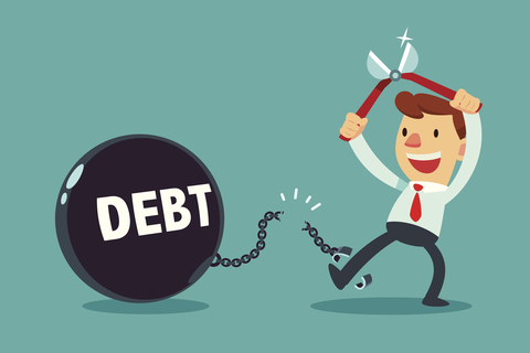 Getting out of debt Illustration of man cutting himself free from a chain attached to a ball that says "debt"