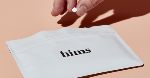 a Hims-branded pouch for medications ordered on the Hims website