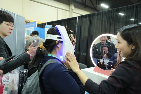 CES 2020 woman wearing white virtual reality device