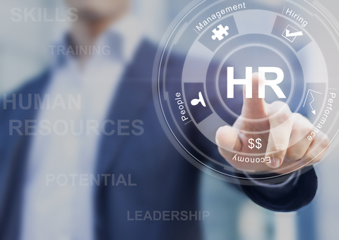 Human Resources Job Management Employees CREDIT: Getty/NicoElNino Manager touching a clear screen with human resources concepts on it
