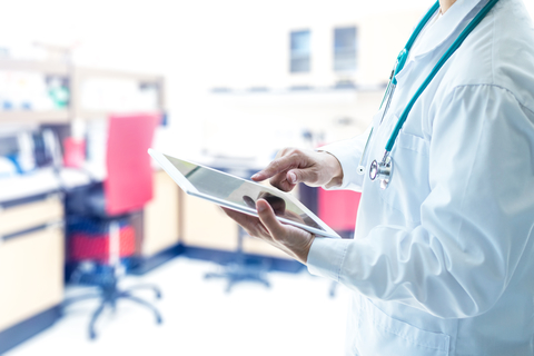 health IT doctor using tablet