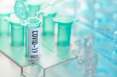 COVID-19 A pipette labeled Covid-19