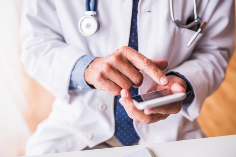 Doctor on phone Doctor on phone