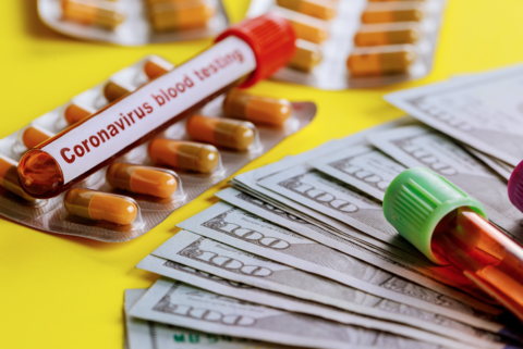 Cost of coronavirus A coronavirus blood test with money
