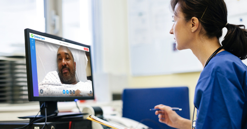 American Well Aligned Telehealth a female behavioral health specialist consults via video with a patient
