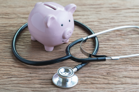 Salary A piggy bank with a stethescope