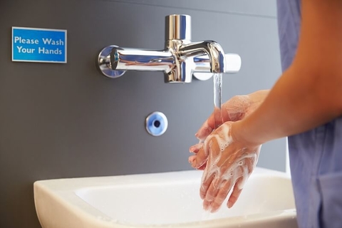 Hand wash washing hygiene infection control patient safety (Getty/monkeybusinessimages) A medical worker washing her hands at a sink.