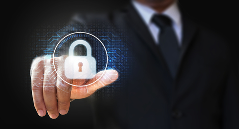 cybersecurity BBusinessman touching lock icon on binary code and circuits background