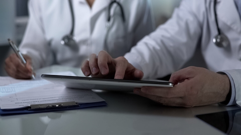 Doctors with tablet Doctors with a tablet