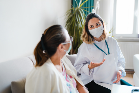 Community health worker A photo of a community health worker wearing a mask
