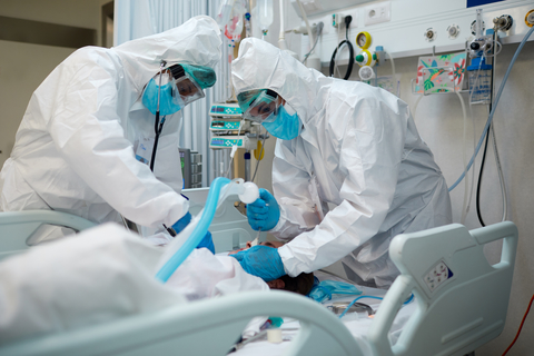 Healthcare workers intubation a COVID-19 patient Hospital COVID Healthcare workers during an intubation procedure to a COVID patient