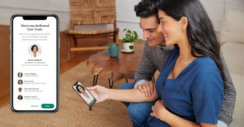 Maven Clinic a couple speaks to a doctor virtually using a telehealth app on a smartphone
