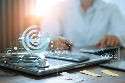 healthcare data Hands of doctor doing finances and calculate on table and healthcare business graph data and growth on hospital background