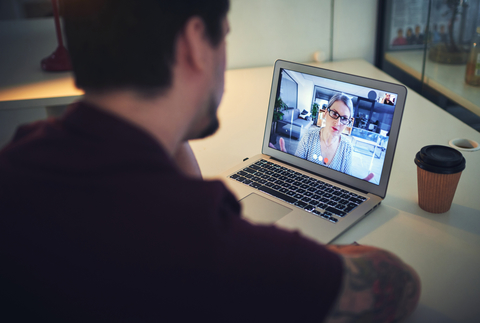 telehealth therapy Photo of psychologist conducting an online therapy session with her patient