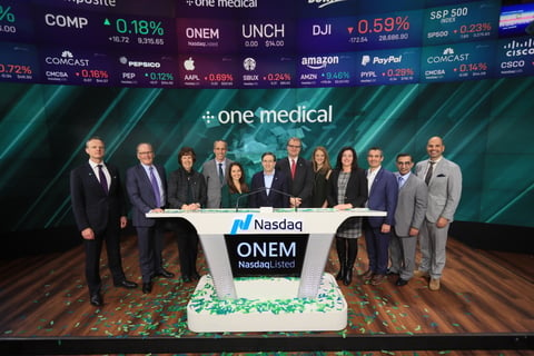 Staff and executives at One Medical ring the Nasdaq opening bell January 31