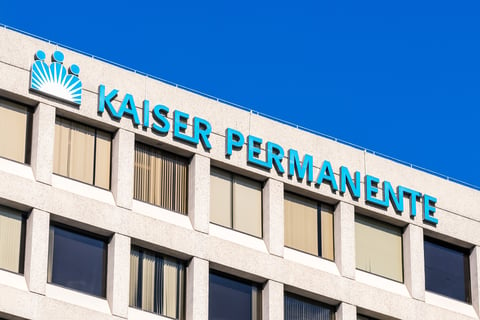 The side of a building that reads "Kaiser Permanente"
